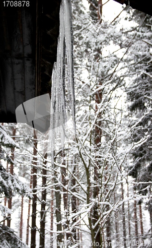 Image of icicles on the roof of a country house