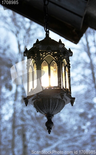 Image of Beautiful latern in winter landscape