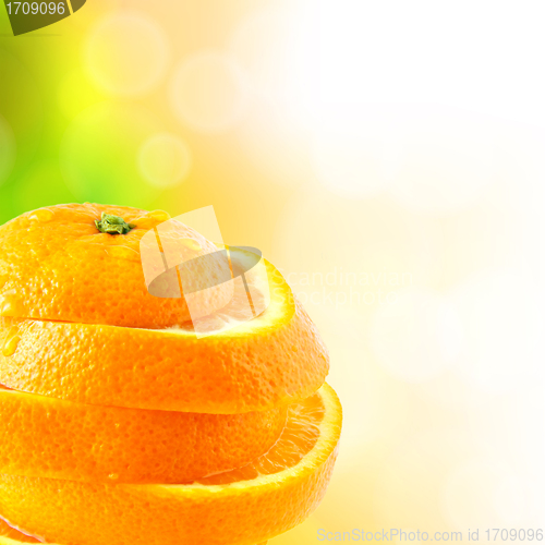 Image of juicy orange cut into slices