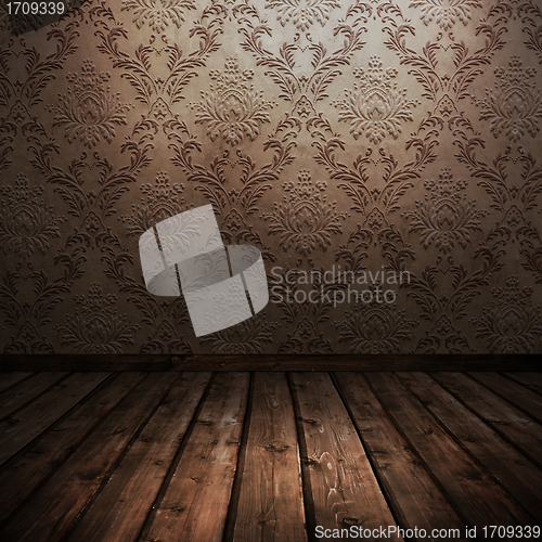 Image of room with old wallpaper
