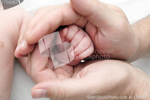 Image of hands of the baby