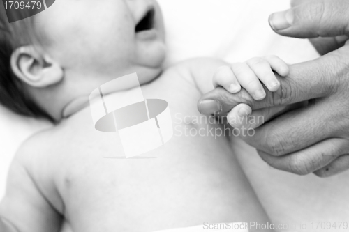 Image of hands of the baby