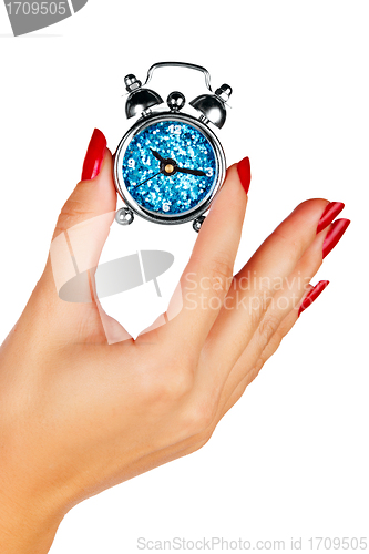 Image of woman hand with a clock