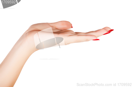 Image of woman hand with red nails manicure