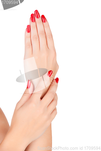 Image of woman hands with red nails