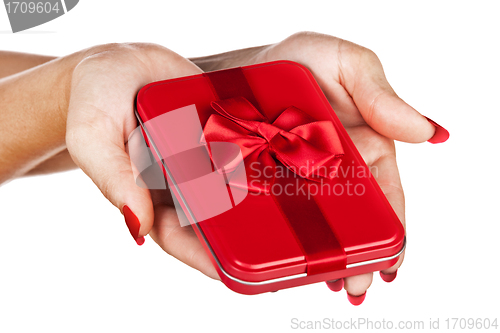 Image of red gift box in woman's hands