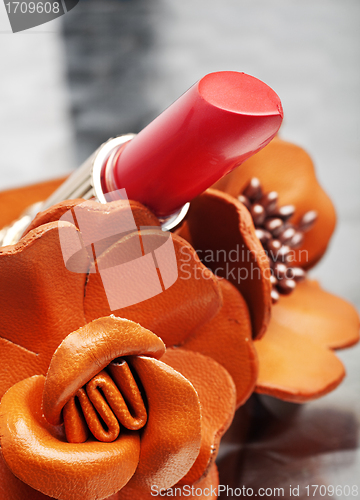 Image of coral pink lipstick close-up