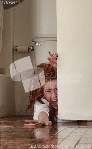 Image of Horror Themed Image With Bleeding Freightened Woman