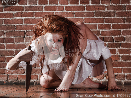 Image of Horror Themed Image With Bleeding Freightened Woman