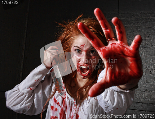 Image of Horror Themed Image With Bleeding Freightened Woman