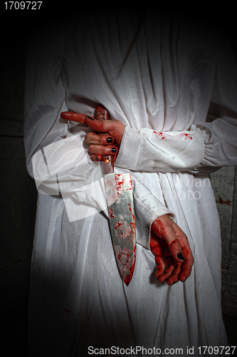 Image of Horror Themed Image With Bleeding Freightened Woman