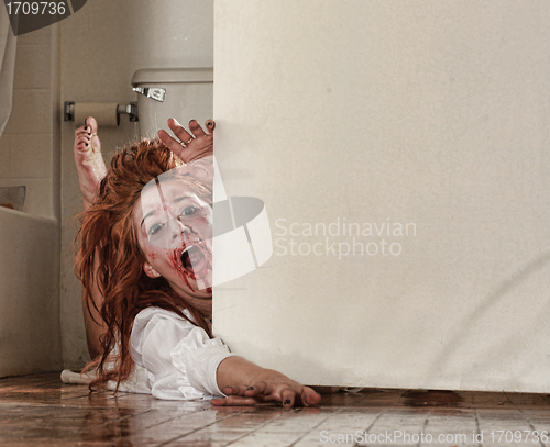 Image of Horror Themed Image With Bleeding Freightened Woman