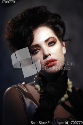 Image of High Fashion Woman With Piercing Eyes