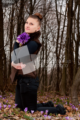 Image of girl with snowdrops