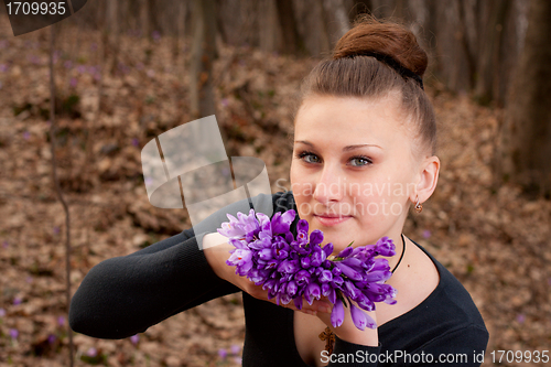 Image of girl with snowdrops