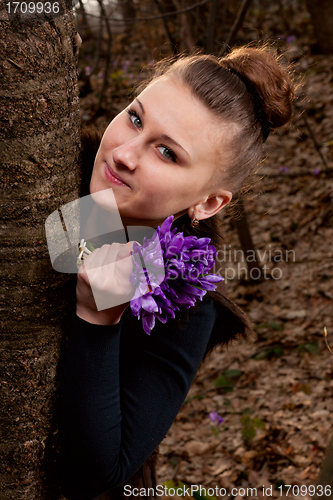 Image of girl with snowdrops