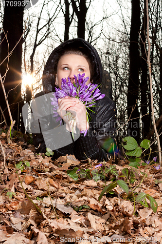 Image of girl with snowdrops