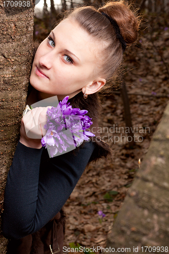 Image of girl with snowdrops