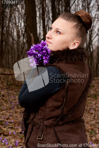 Image of girl with snowdrops