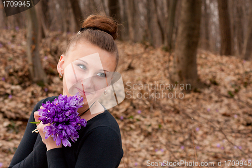 Image of girl with snowdrops