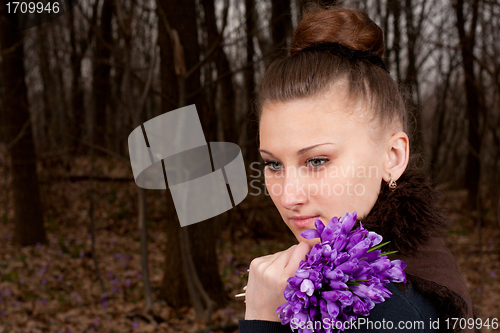 Image of girl with snowdrops