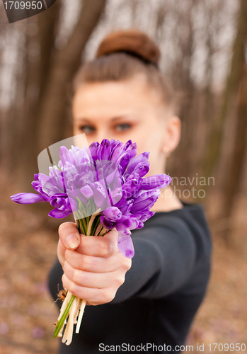 Image of girl with snowdrops