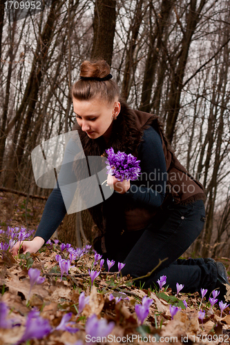 Image of girl with snowdrops