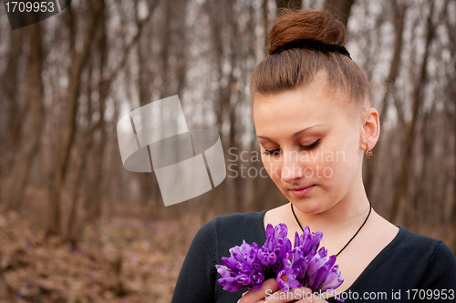 Image of girl with snowdrops