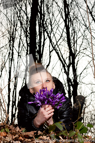 Image of girl with snowdrops