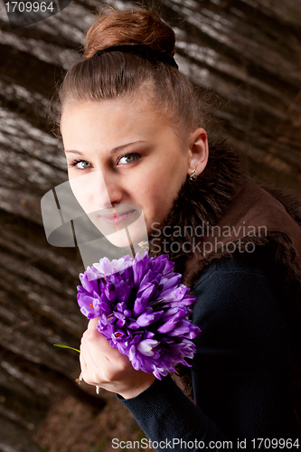 Image of girl with snowdrops