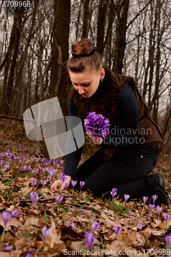 Image of girl with snowdrops