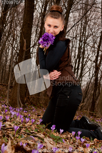 Image of girl with snowdrops