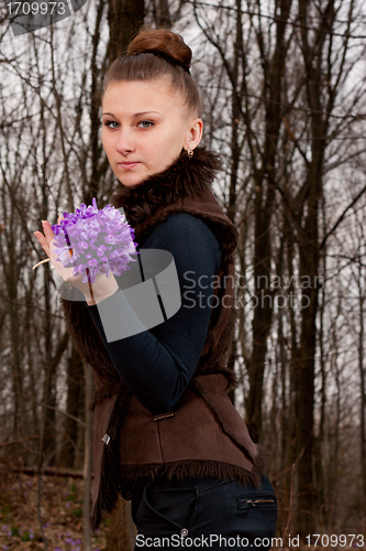 Image of girl with snowdrops