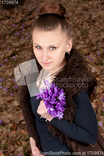 Image of girl with snowdrops