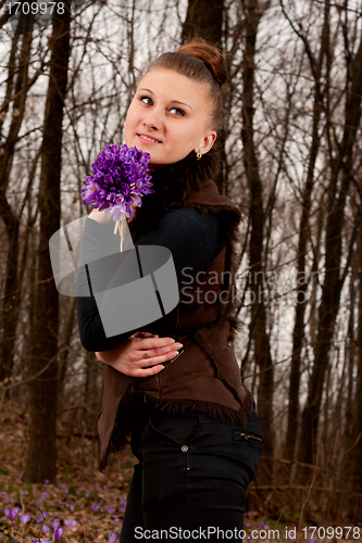 Image of girl with snowdrops