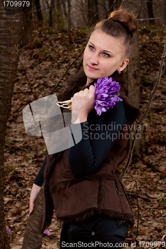 Image of girl with snowdrops