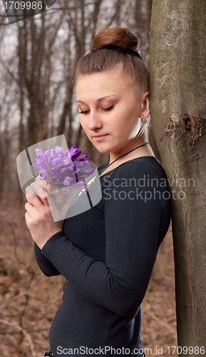 Image of girl with snowdrops