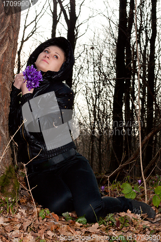 Image of girl with snowdrops