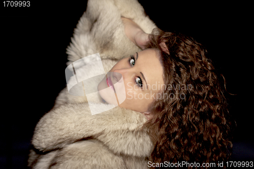 Image of girl in a fur coat