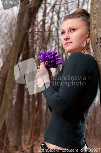 Image of girl with snowdrops