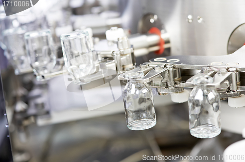 Image of pharmacy medicine glassware at washing