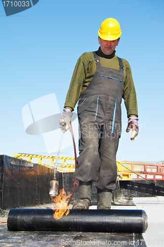 Image of Flat roof covering works with roofing felt