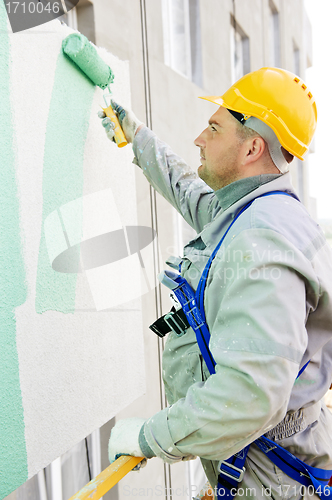 Image of builder facade painter at work