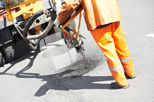 Image of Asphalt patching roadworks