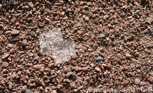 Image of texture of many little red stones