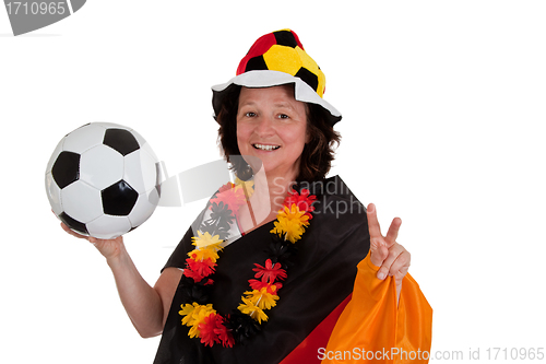 Image of Female soccer fan with ball