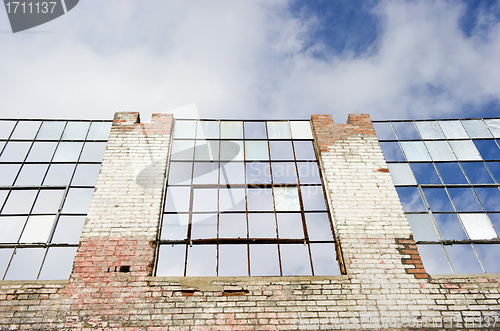 Image of Deteriorating old building with sky