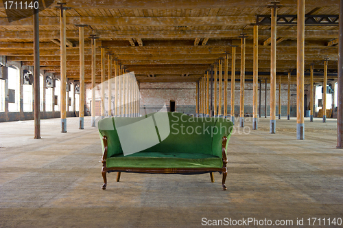 Image of Antique Green Couch in old building