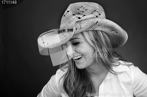 Image of Beautiful Cowgirl laughing