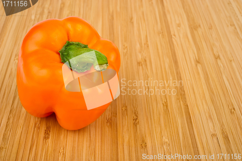Image of Orange Bell Pepper on Cutting Board
